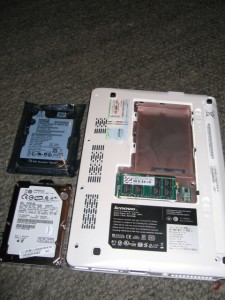 Laptop hard drive mounted in a tray